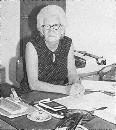Ms. Gwen at desk