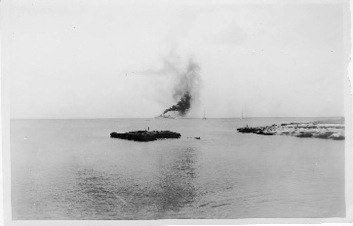 HMS Warship leaving with TRNVR Caymanian Seamen all volunteers